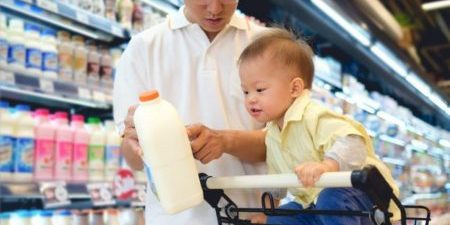 Asian Father & Cute little 18 months / 1 year old toddler boy ch a father choosing milk product with his son | BookDoc