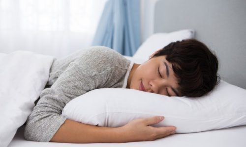 content-young-asian-girl-sleeping-bed_1262-4941 Tips to overcome a weight-loss plateau - Get enough sleep | BookDoc