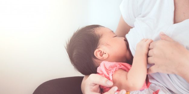 mother-breastfeeding-her-newborn-baby-girl_7186-2531 A mother is breastfeeding her baby | BookDoc