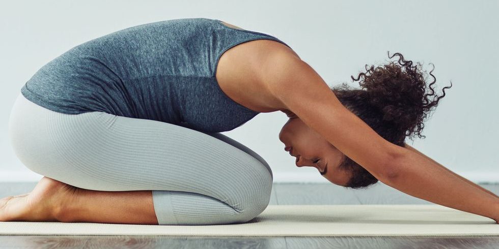 achieving-sound-of-mind-through-yoga-royalty-free-image-1569264982 child pose stretch after waking up | BookDoc