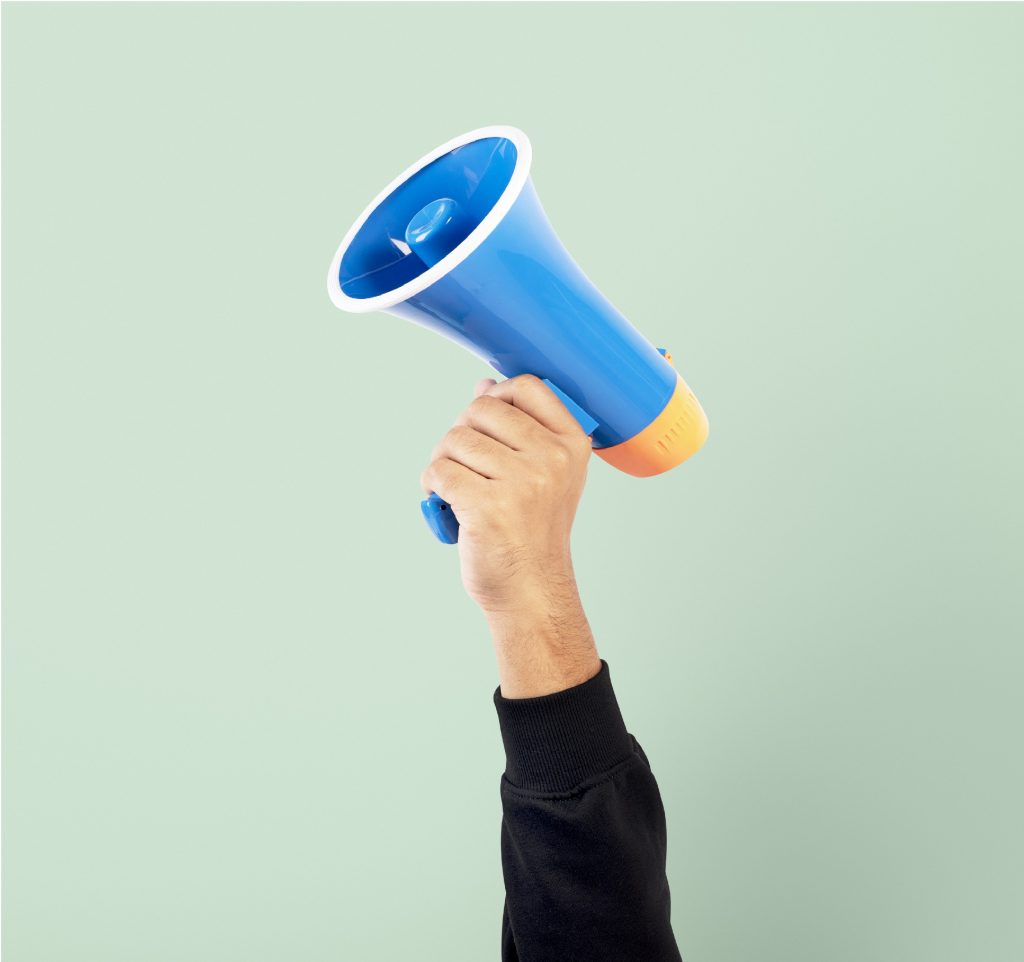 Hand holding megaphone marketing announcement campaign prostate cancer | men's health