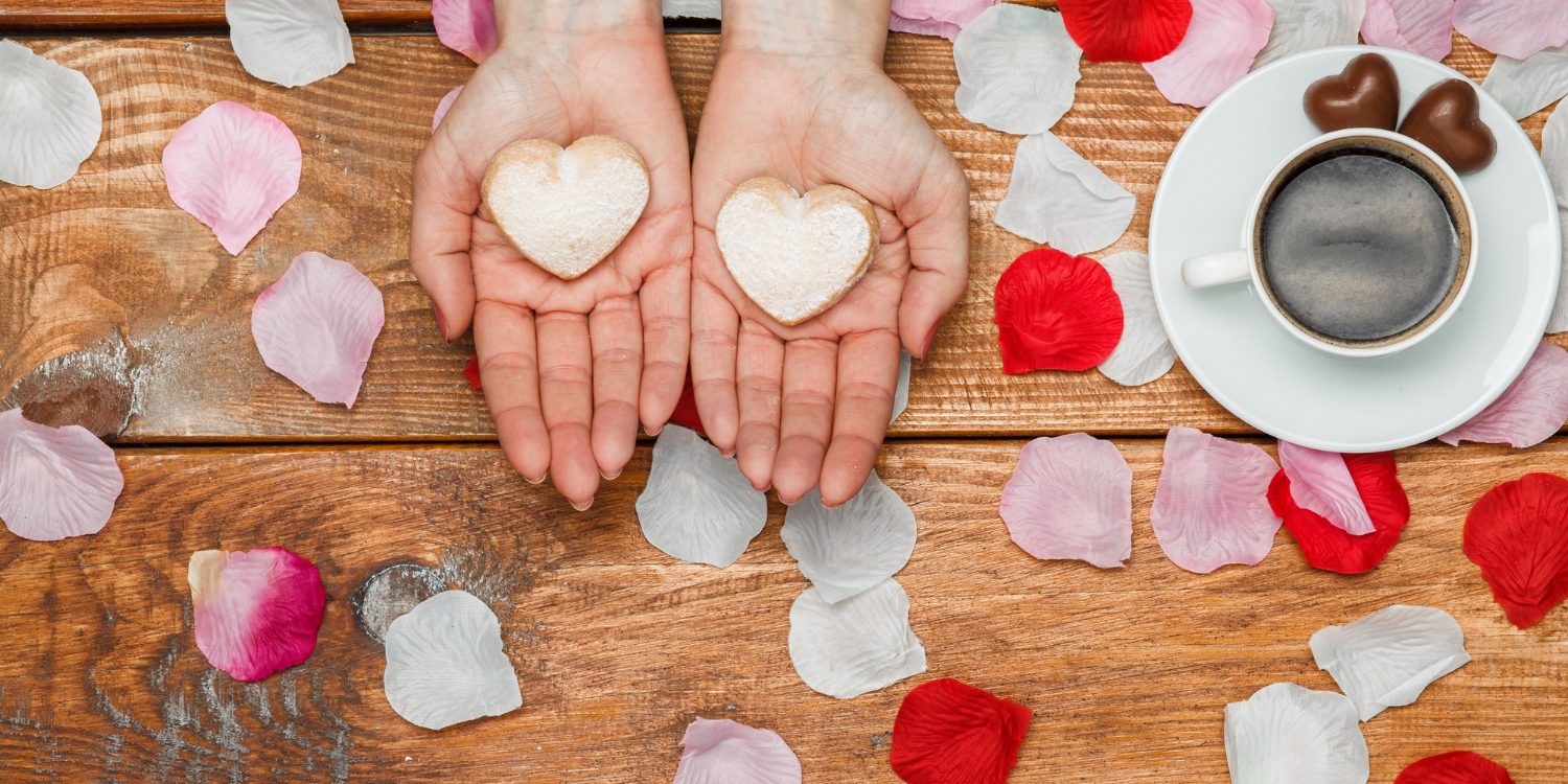 valentines-day-concept-female-hands-with-hearts-wooden-with-flower-petals-cup-coffee Valentine background photo | BookDoc