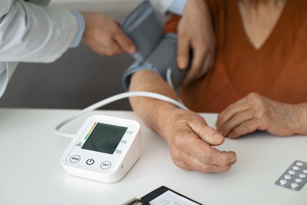 older-person-checking-their-blood-pressure-with-tensiometer (1)